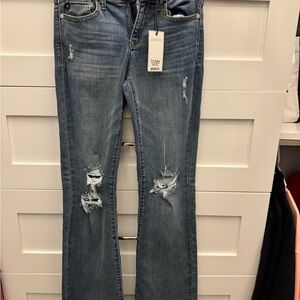 NWT Judy Blue mid rise Destroy Flare size 3/26